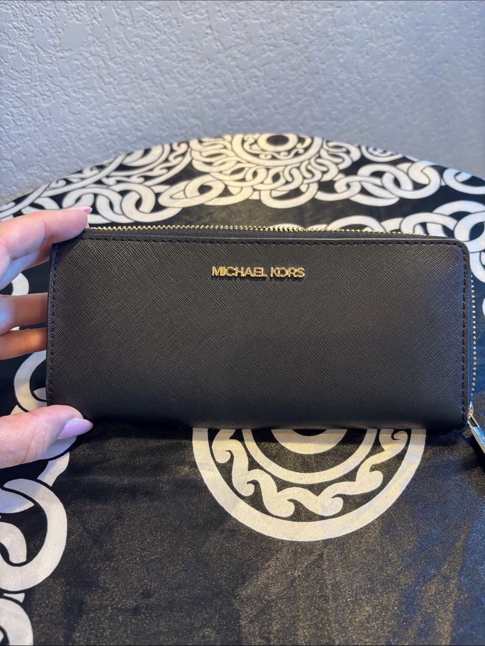 Michael Kors Black Zip-Around Saffiano Wallet with Gold Logo